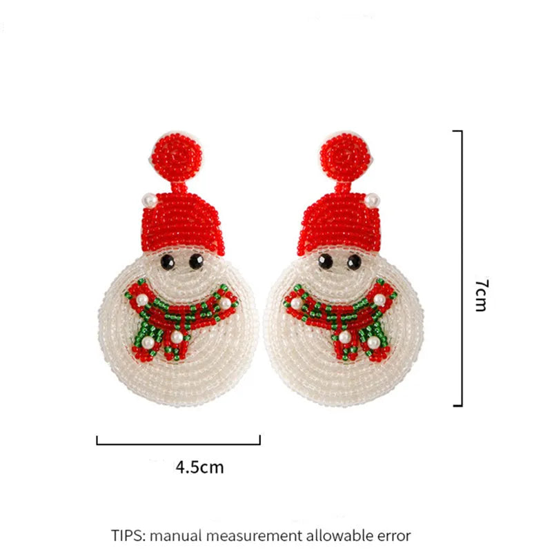 White acrylic snowman bead earrings on a white background, geometric shape, one pair shown