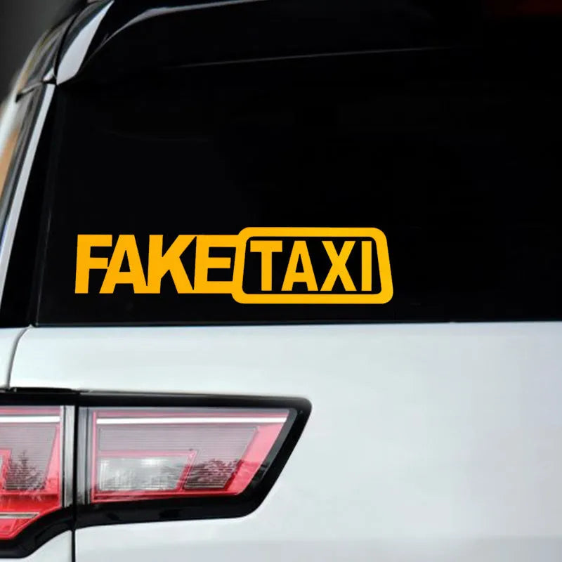 Yellow 'FAKE TAXI' waterproof PET car warning sticker measuring 20cm by 8cm.