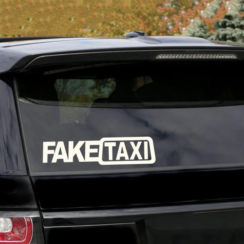 Yellow 'FAKE TAXI' waterproof PET car warning sticker measuring 20cm by 8cm.