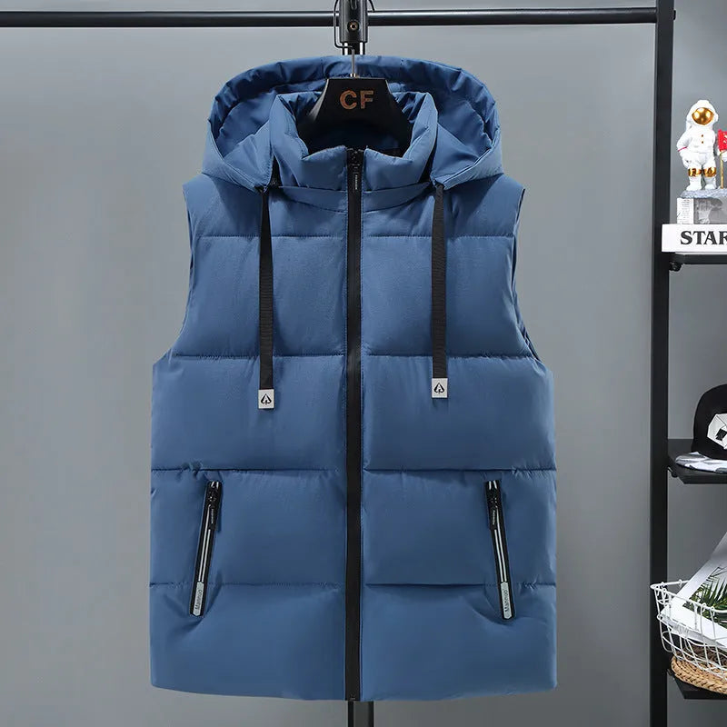Men's solid blue fleece-lined vest with a detachable hood on a hanger.