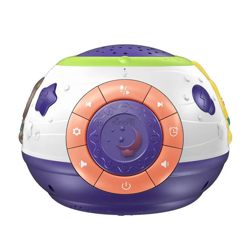 White plastic starry sky night light projector for children on a table, projecting blue stars onto a wall.
