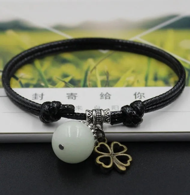 Luminous hand-woven bracelet with wax string chain and zinc alloy anchor pendant in Sapphire Blue