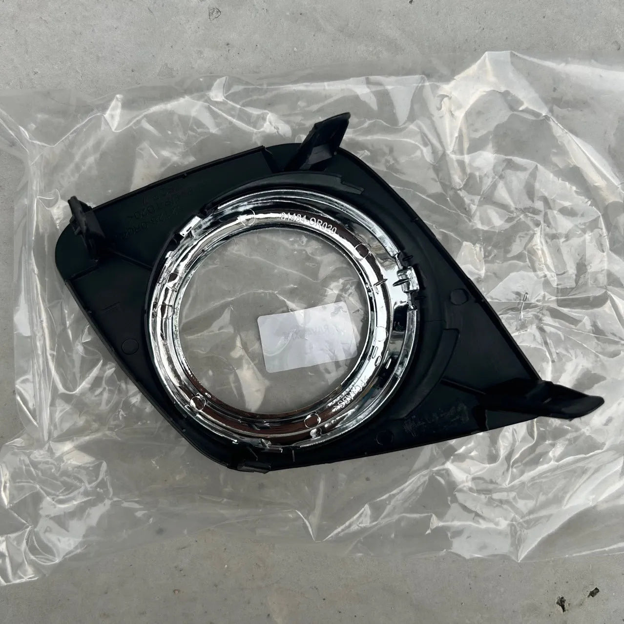 Black Toyota RAV4 front bumper anti-fog light cover for driver or passenger side