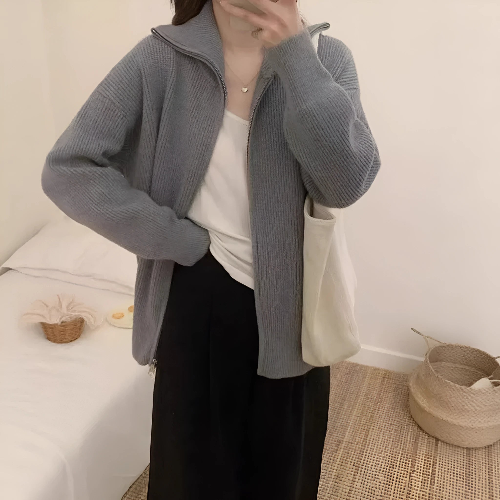 Hong Kong style grey double zipper knitted cardigan jacket with a floral pattern, shown on a model.