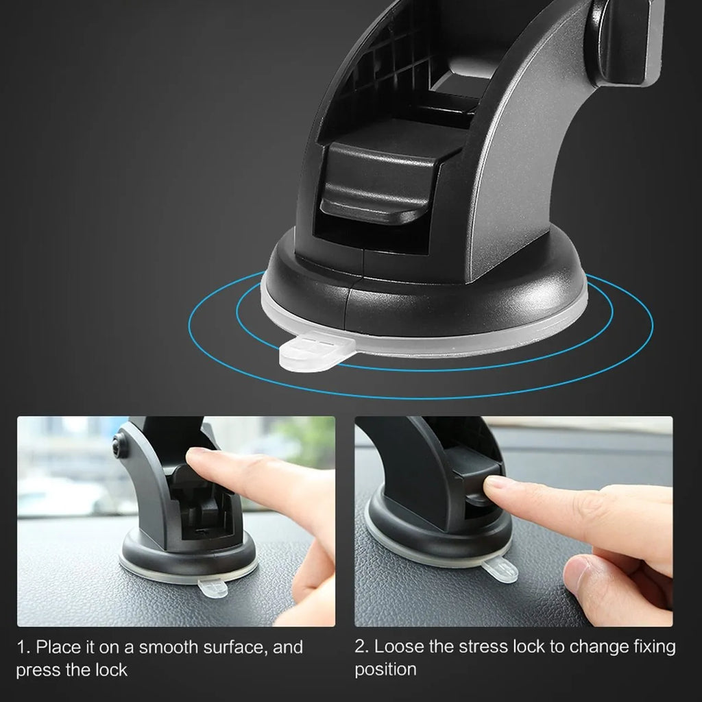 Yellow and black telescopic car phone holder with suction cup mounted on a dashboard.