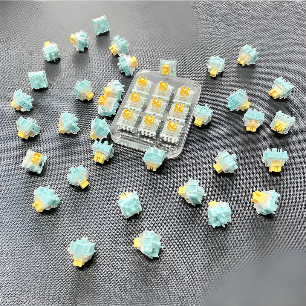 36 Sea Salt Lemon coloured PRO Mute keyboard switch shafts arranged in a pack.