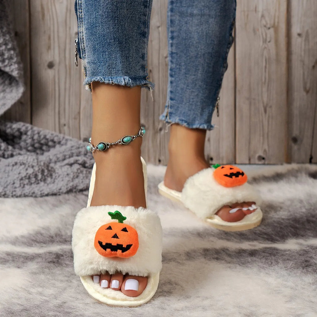 Open toe pumpkin plush slippers in synthetic fur with cartoon design and PVC soles