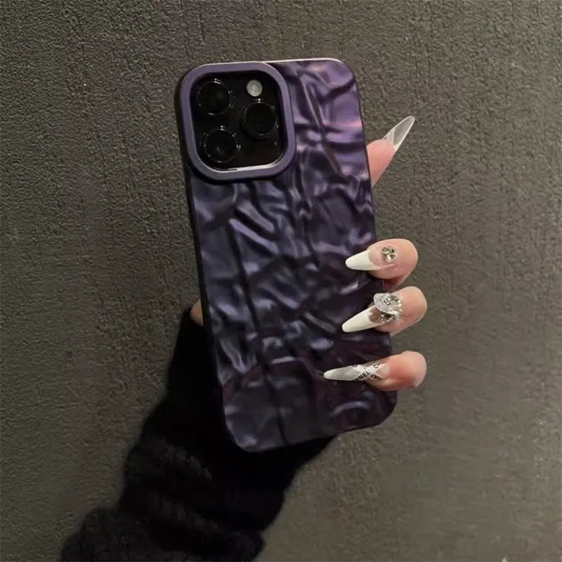 Tin foil pleated silicone phone case for Apple iPhone in black with embossed finish