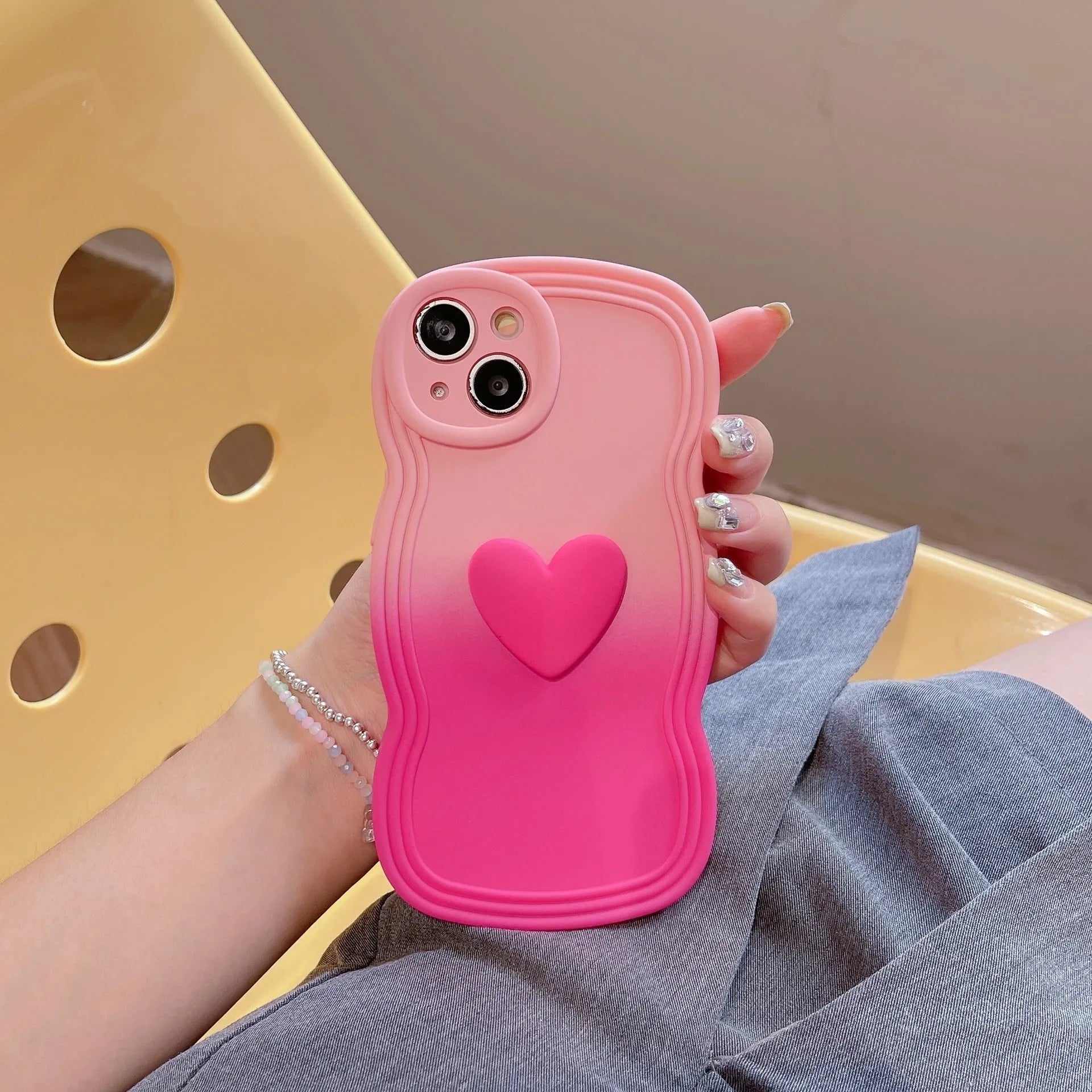 Liquid silicone love heart wavy edge phone case in red gradient black for iPhone 14 Pro Max