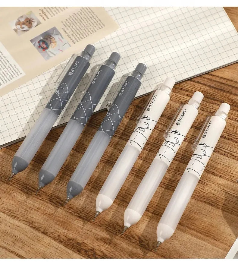 Black and white 0.5mm mechanical pencils with a soft cloud grip on the holder.