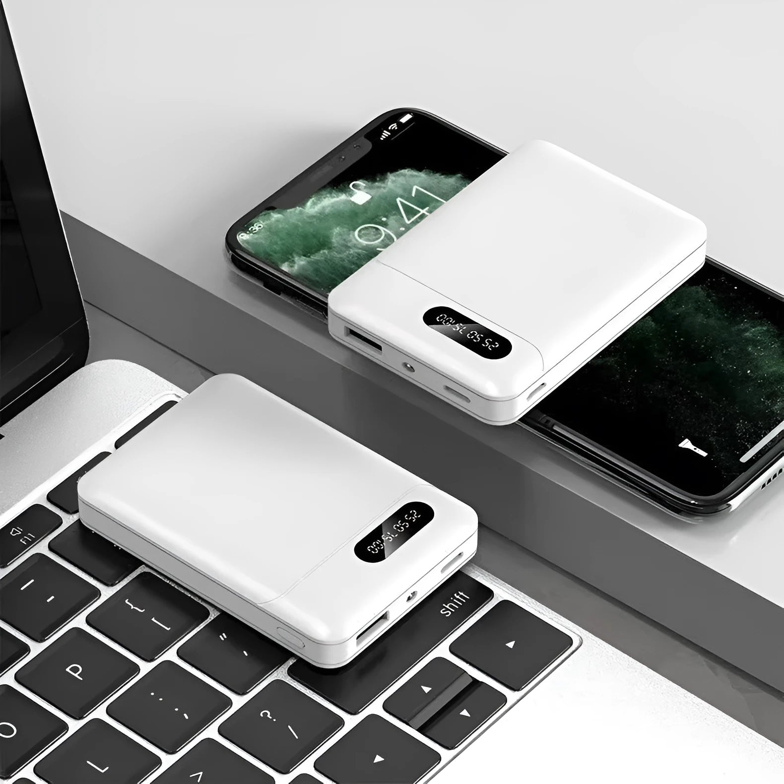 White and black 10000 mAh power bank with multiple USB ports for charging smartphones and tablets