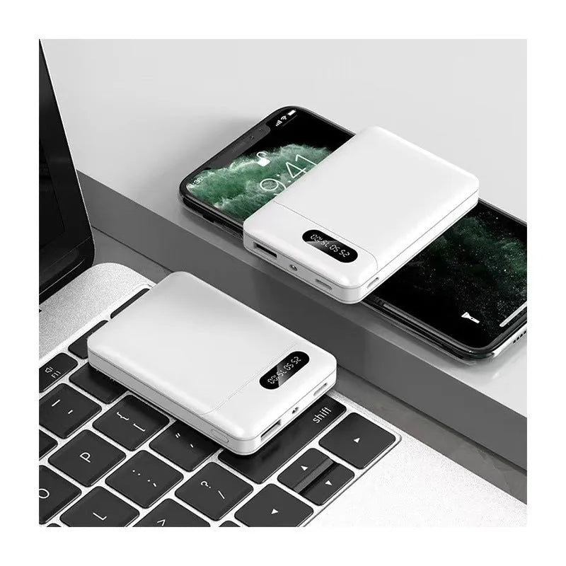 White and black 10000 mAh power bank with multiple USB ports for charging smartphones and tablets