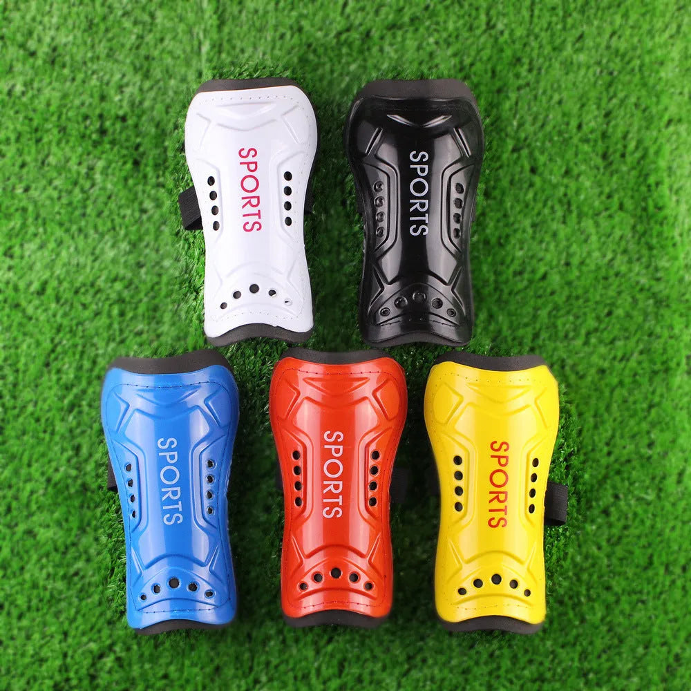 Pair of football shin guards with strap, solid colour, size L 19cm and size S 13.5cm