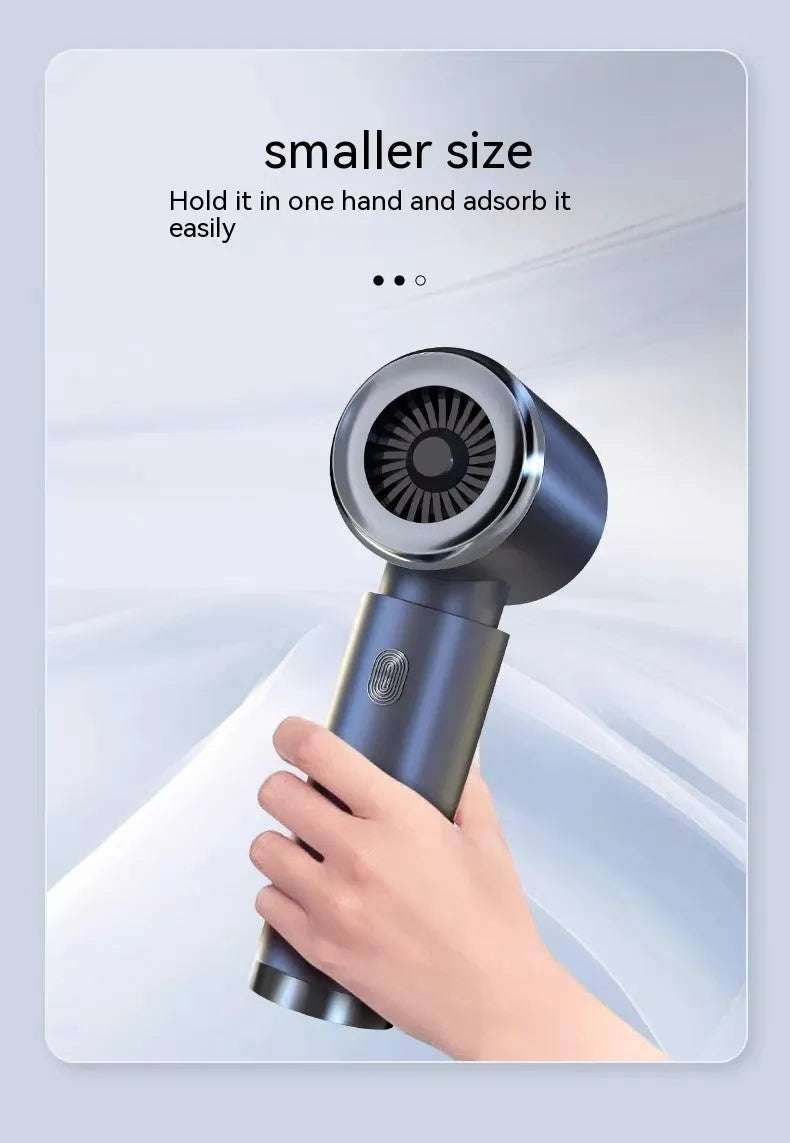 Space grey handheld cordless car vacuum cleaner and inflator with a 6000mAh battery.