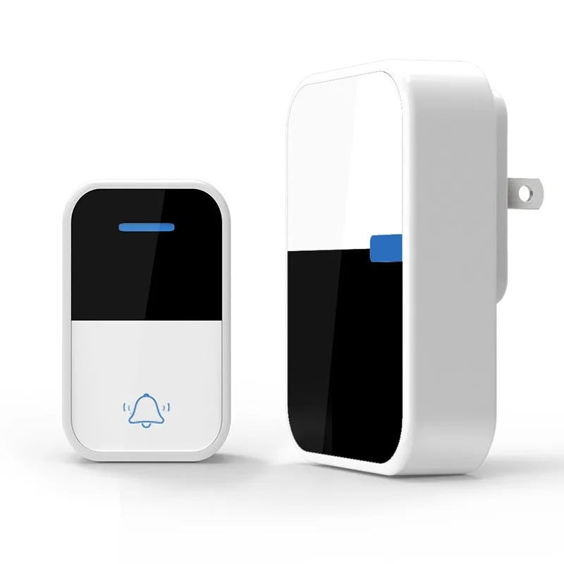 Modern white wireless doorbell kit with plug-in receiver and self-powered push button on a wooden door frame.