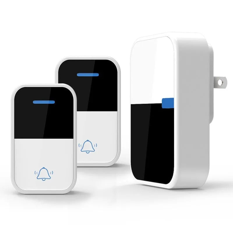 Modern white wireless doorbell kit with plug-in receiver and self-powered push button on a wooden door frame.