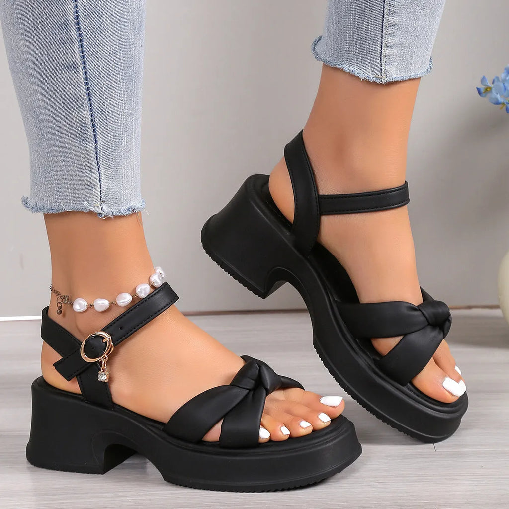Black thick heel slippers with button fastening and rubber sole