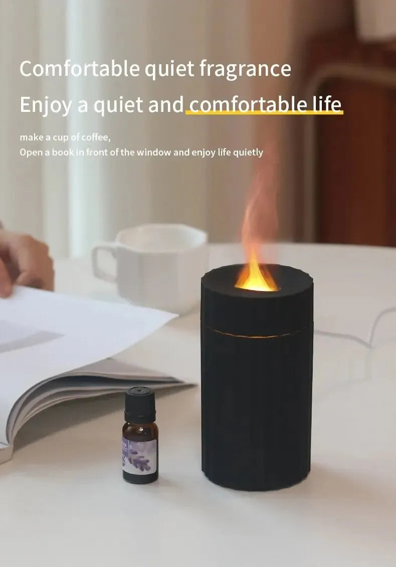 Essential oil diffuser humidifier with flame effect LED lighting in black or white colour option