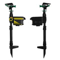 Black automatic PIR animal repellent garden sprinkler made of ABS plastic with rotating nozzle on grass