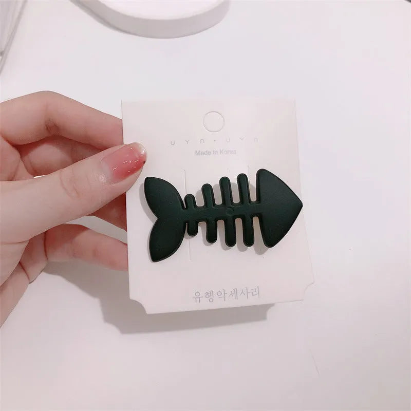Minimalist fishbone pattern hair barrette with duckbill clip in a candy colour.