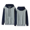 Loose fleece-lined hoodie in contrast colour combination with regular sleeves