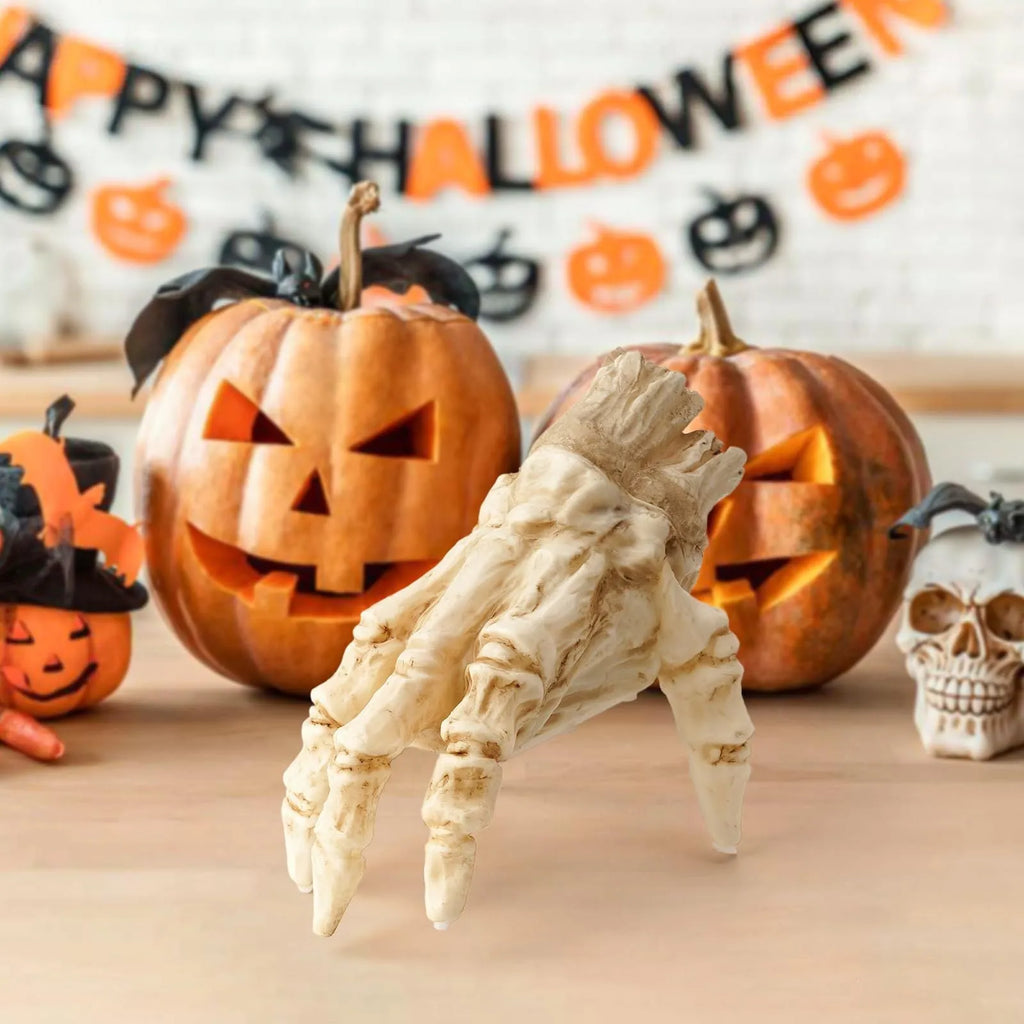Halloween electric luminous crawling hand on floor, glowing warm colour, vinyl zombie hand with spooky sound