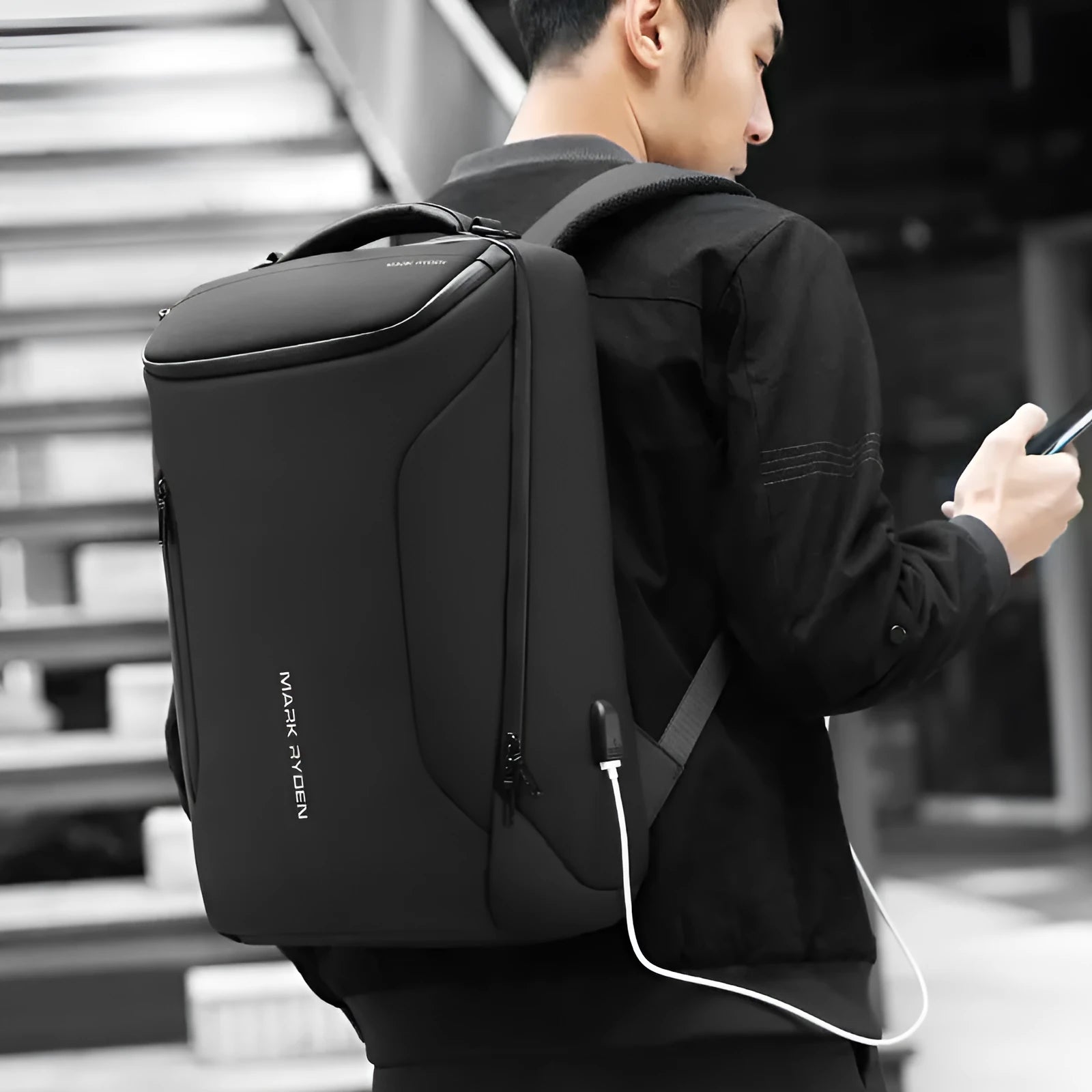 Black Oxford cloth backpack with USB charging port and 108° opening design, 20-35L capacity