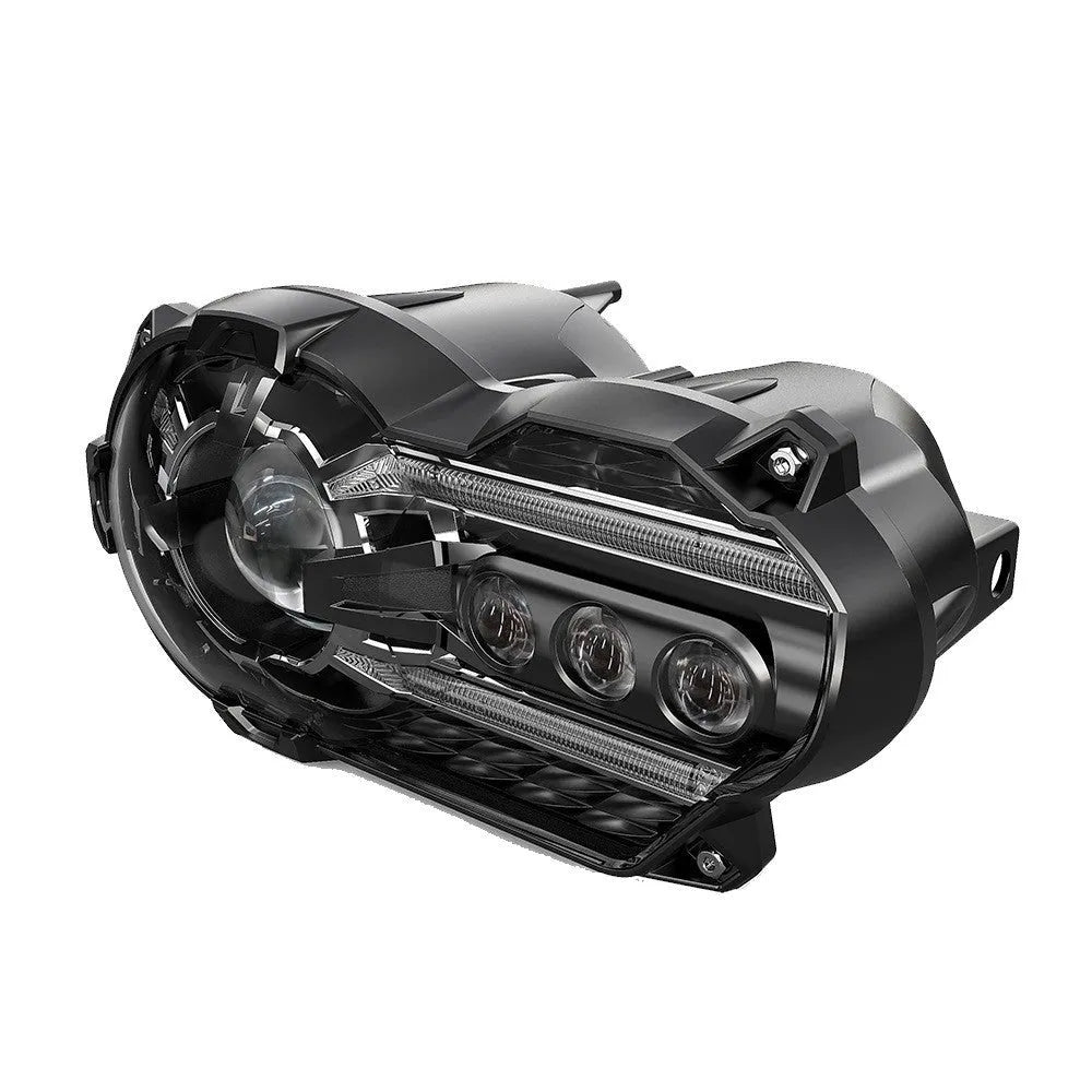Black background LED motorcycle headlight unit showing front lens and housing.