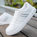Men's black, grey, and white sports shoes shown with a European size and foot length measurement chart.