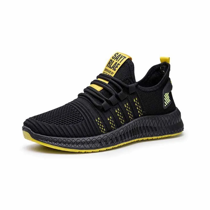 Men's black sports casual trainers with cross strap detail and flying weave textile upper