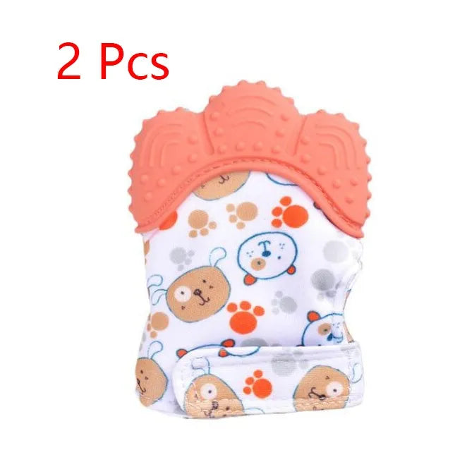 Baby silicone teething glove with Velcro strap in a smiley face yellow design.