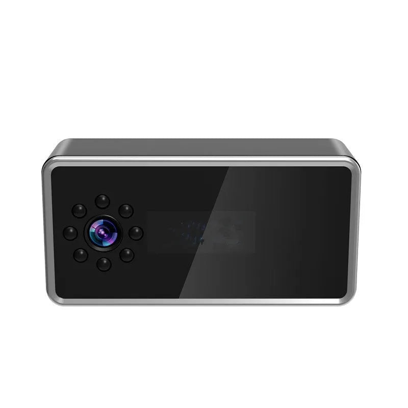 Compact wireless home surveillance camera on a table