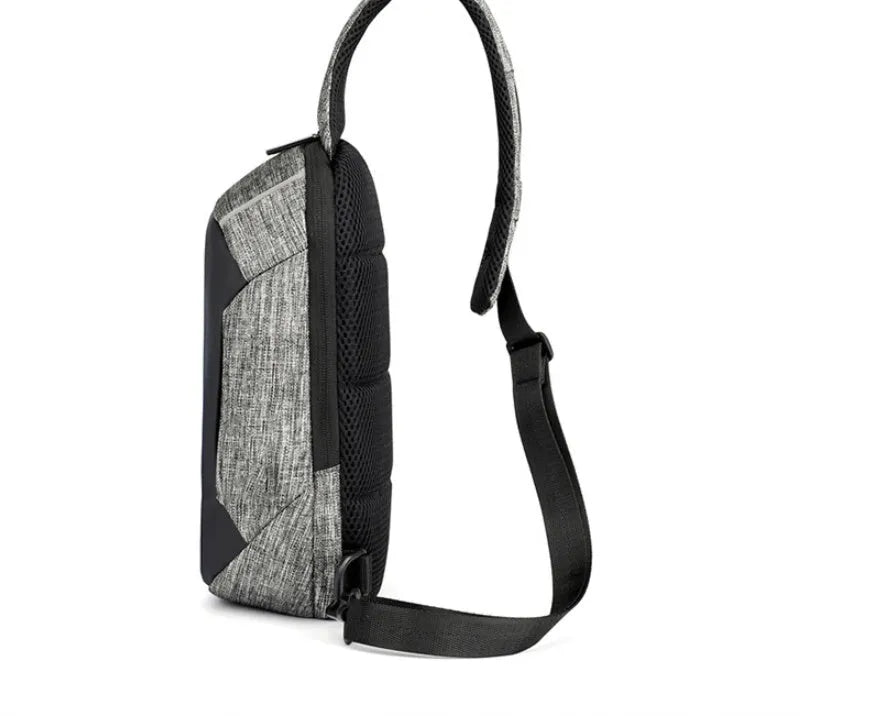 Dark blue Oxford cloth chest bag with a zipper and adjustable strap, shown from the front.