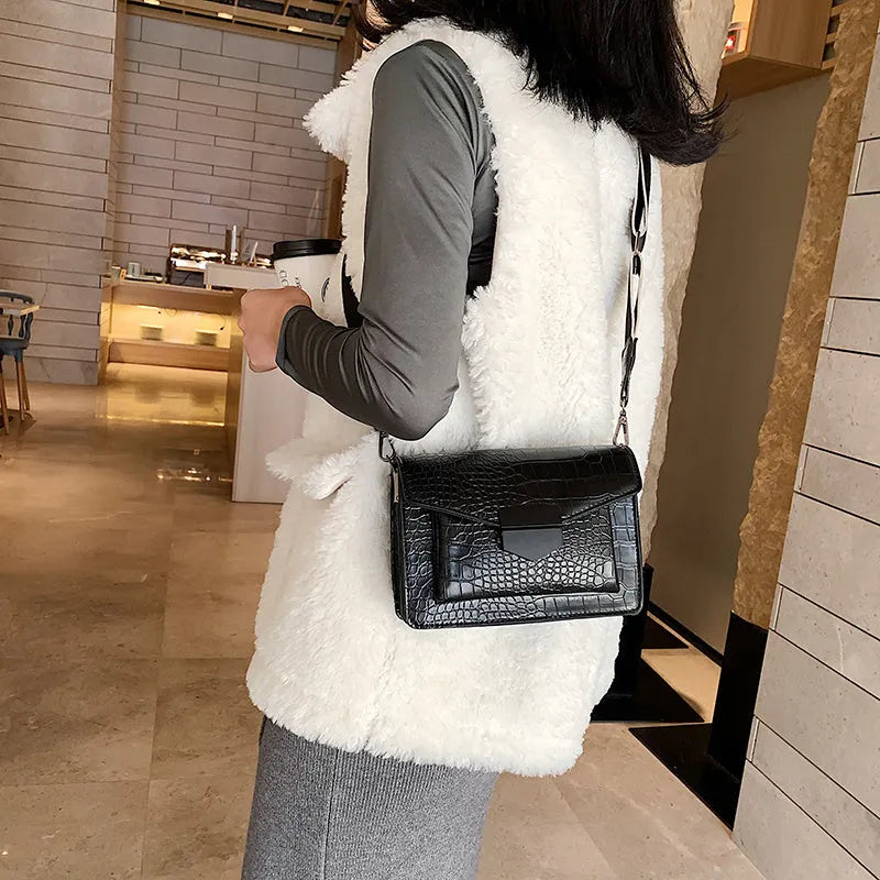 Vintage-style PU leather crossbody bag in black, shown with dimensions for scale.
