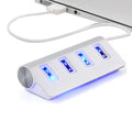 Silver USB-C to 4-Port USB 2.0 hub with aluminium alloy body on white background