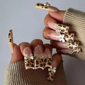 Leopard print butterfly nail art stickers in colour WM296 for women's manicures