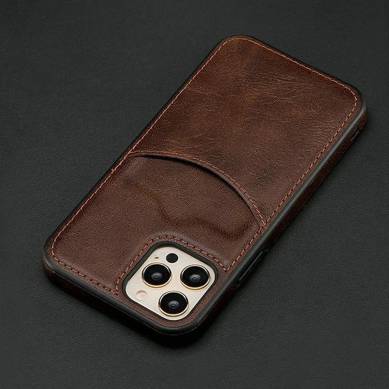Dark blue PU leather snap-on case for iPhone showing precise cutouts for camera and ports.