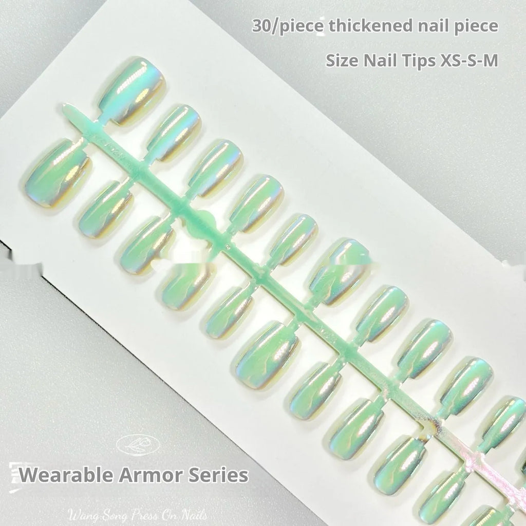 Set of electroplated Cat's Eye false nails in aurora armour style showing short ladder XS, S, and M sizes.