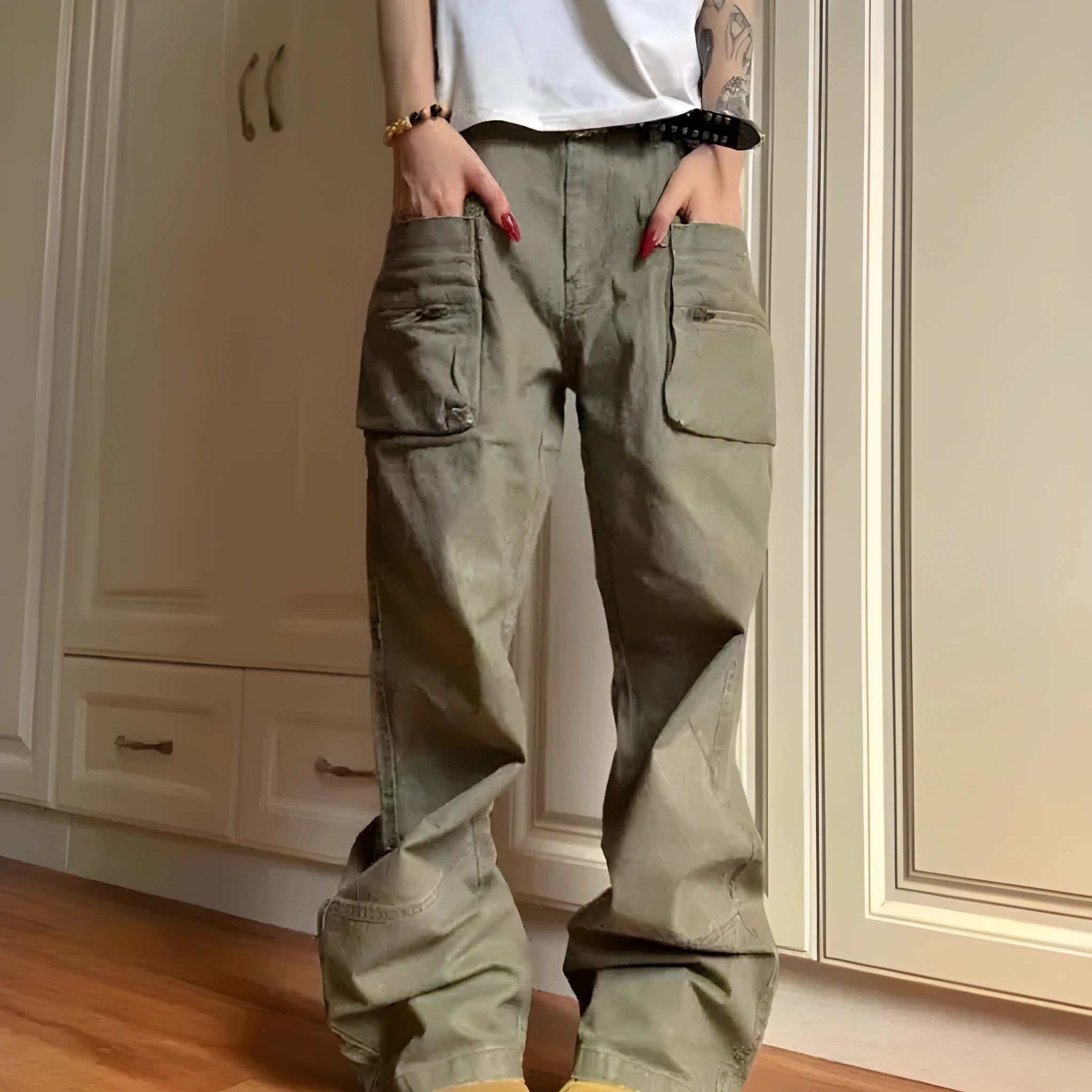 Green double zipper cotton workwear casual pants with a pocket, shown in mid-waist overalls style.