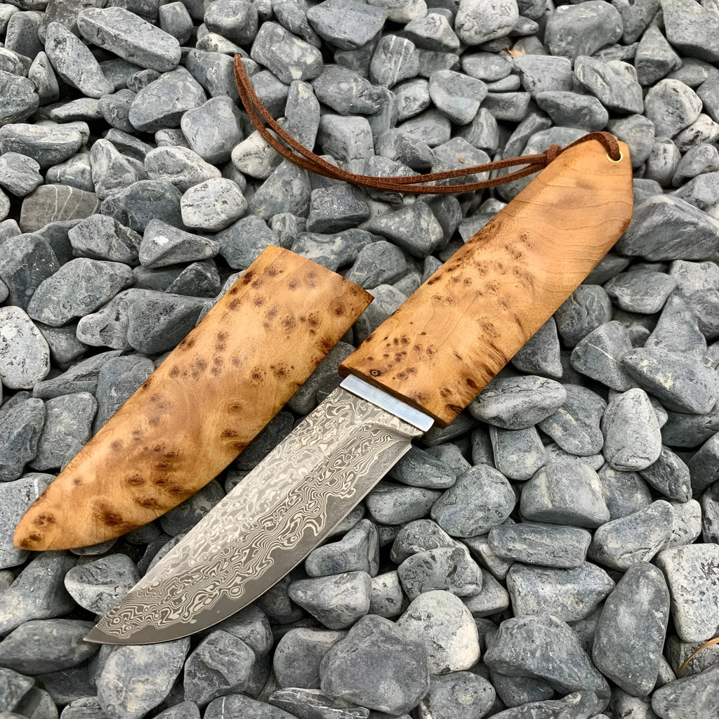 White Shadow Damascus pattern outdoor short knife with Thuja wood handle showing 18cm length