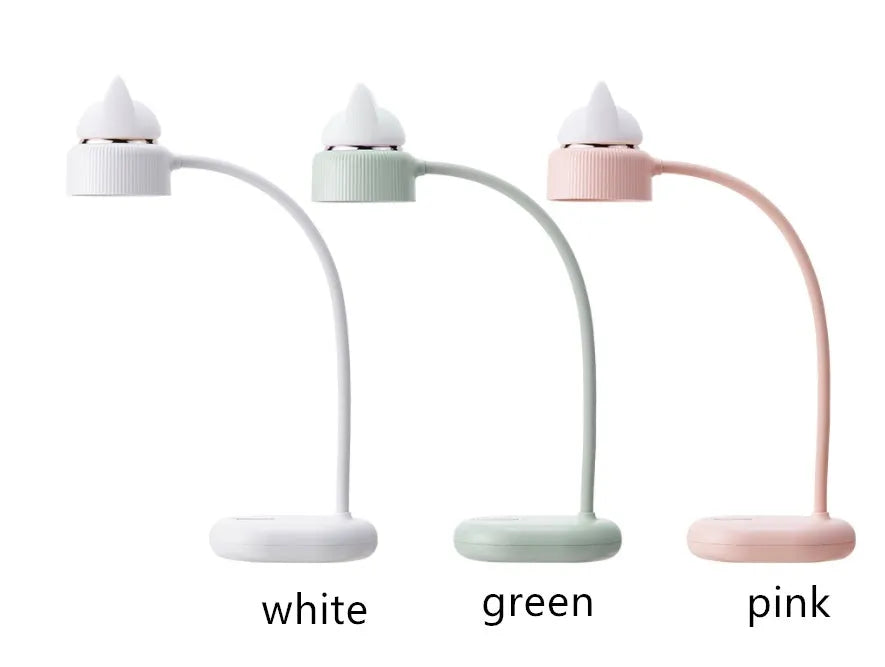 White modern LED desk lamp with clip-on base and touch control, shown on a desk.