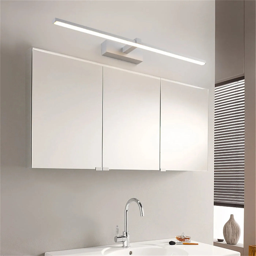 60x8cm black LED bathroom wall lamp with push button switch mounted above a vanity mirror