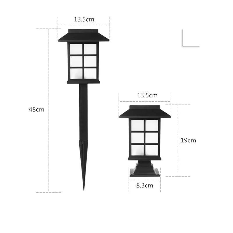 Black solar-powered LED lawn light for outdoor garden and pathway illumination.