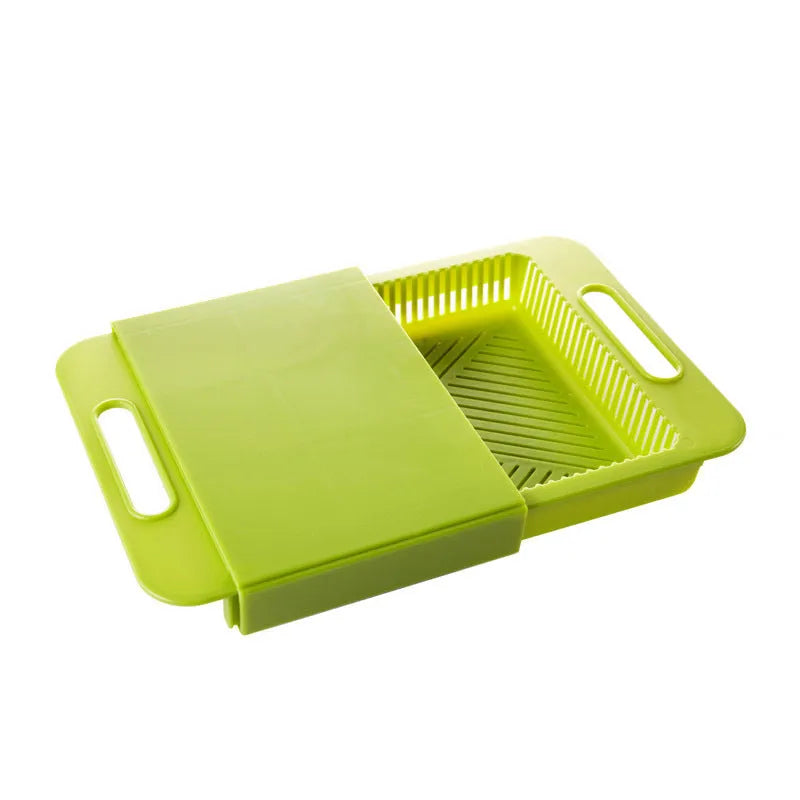3-in-1 multi-purpose cutting board with colander in blue, showing integrated drainer and ergonomic handles