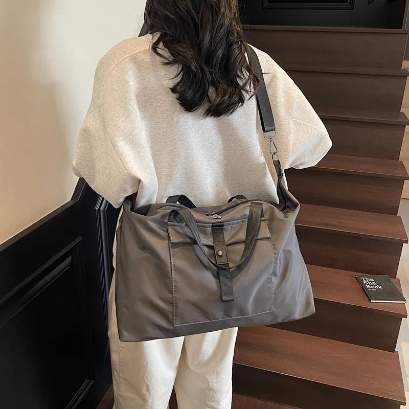 One-shoulder travel backpack in Oxford cloth with 36-55 litre capacity