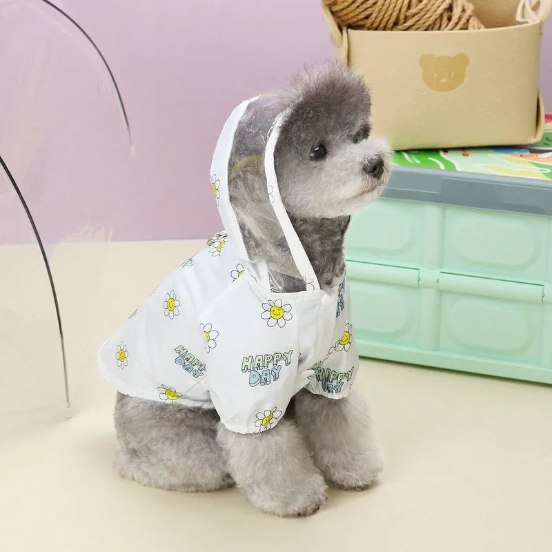 Transparent dog raincoat with small flower print and pull ring traction system