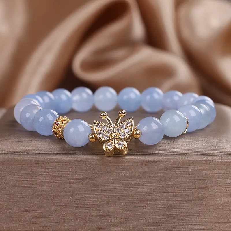 Sky blue aquamarine butterfly crystal bracelet with pearls and rhinestones, 17cm length