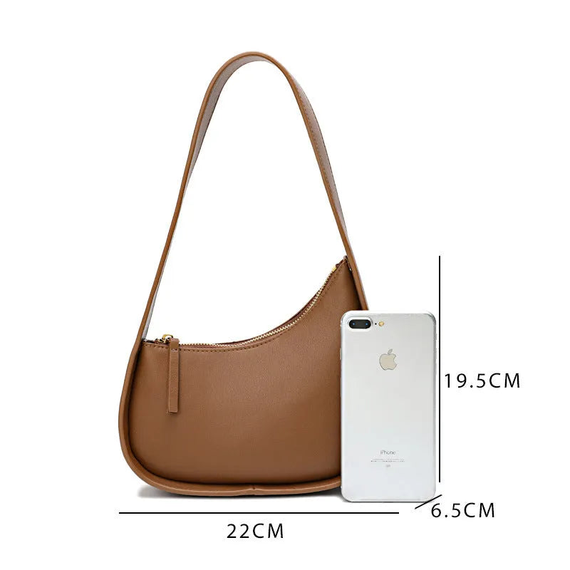 Small leather half moon shoulder bag with wide strap in four colour options