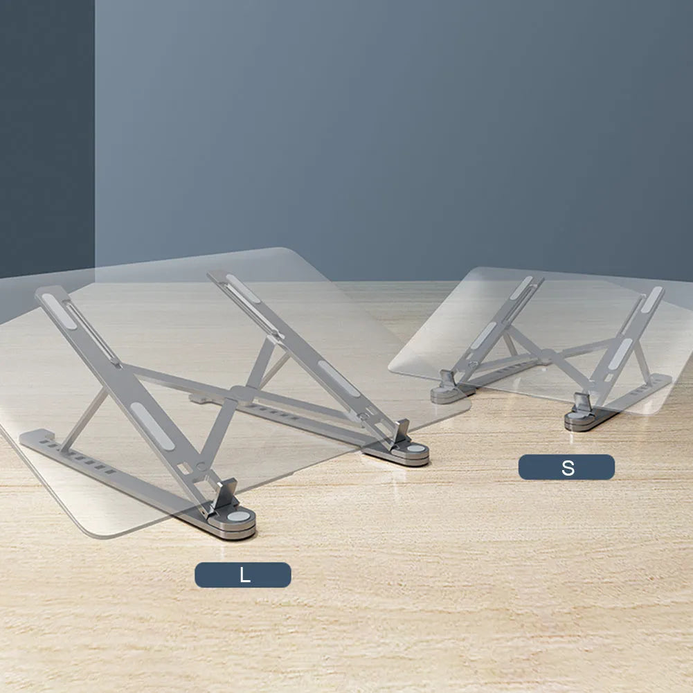 Silver foldable aluminium laptop stand holding a MacBook at an adjusted angle