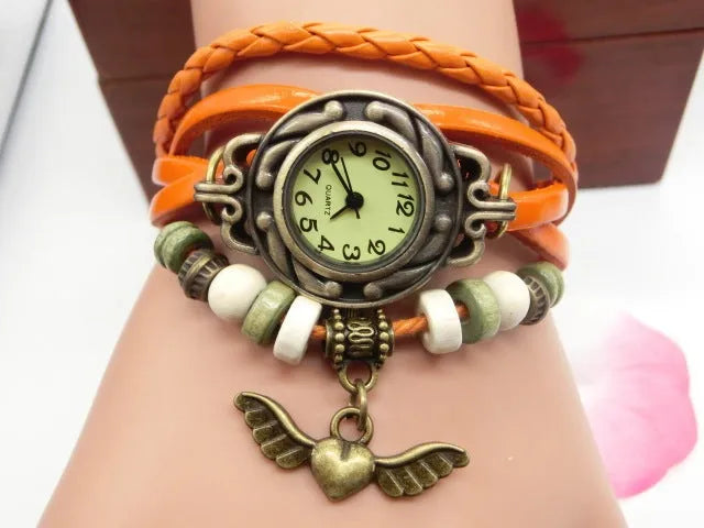 Women's casual quartz watch with flying heart pendant, round 22.5mm dial, PU strap, available in multiple colours
